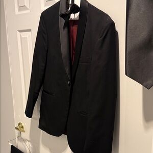 Elegant Black Men's Tuxedo Jacket pants. vest tie and shirt